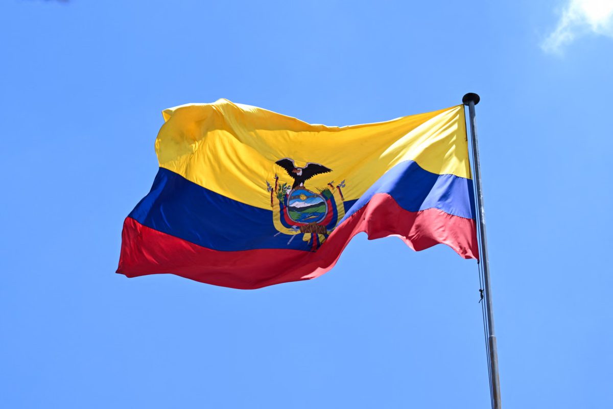 Ecuadorian flag flying in Quito city, Ecuador.